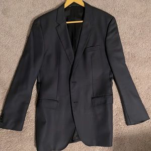 men’s navy blazer by Hugo Boss. 42L with double vent. No pulls, stains or tears